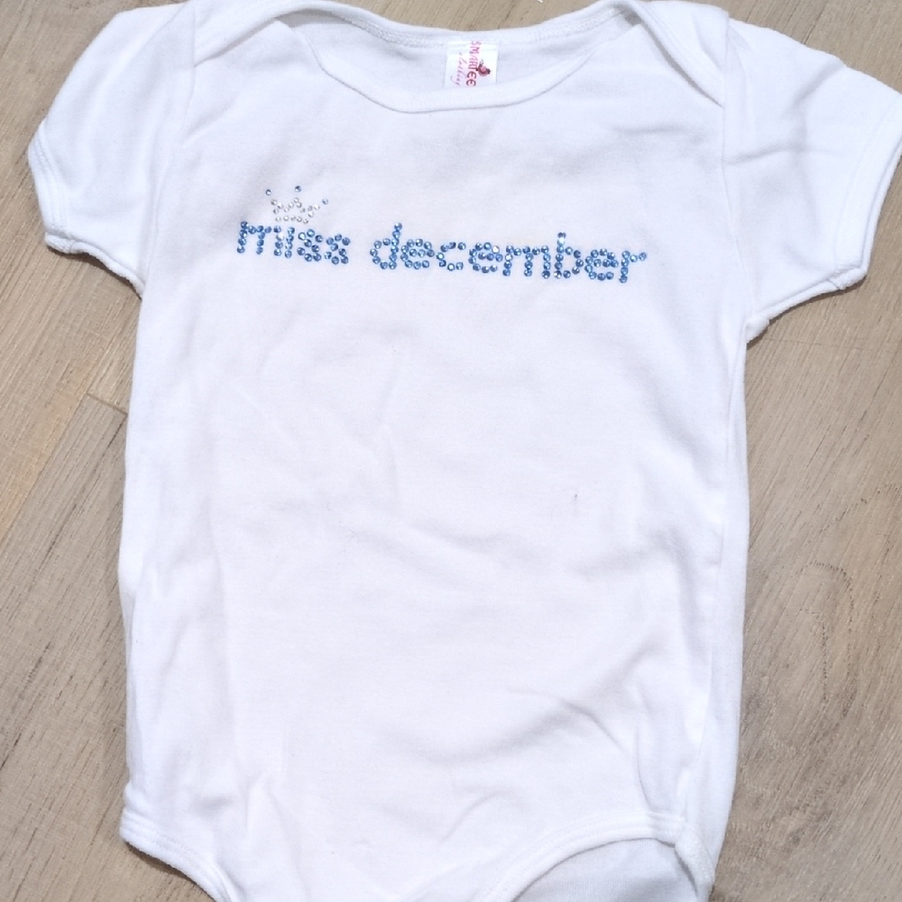 White Infant Onesie with Blue Rhinestone "miss december"